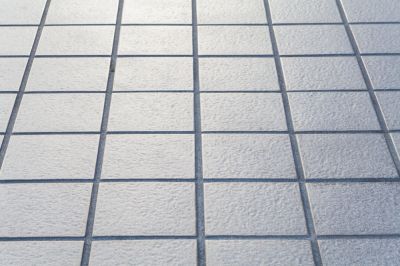 Keep Tiles in Place with Grout Replacement!